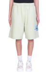 UNDERCOVER SHORTS IN GREEN COTTON