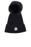 MONCLER MONCLER FUR POM RIBBED BEANIE IN BLUE,00219 00 03510