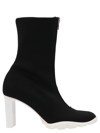 Shop Alexander Mcqueen Slim Tread Ankle Boots In White/black