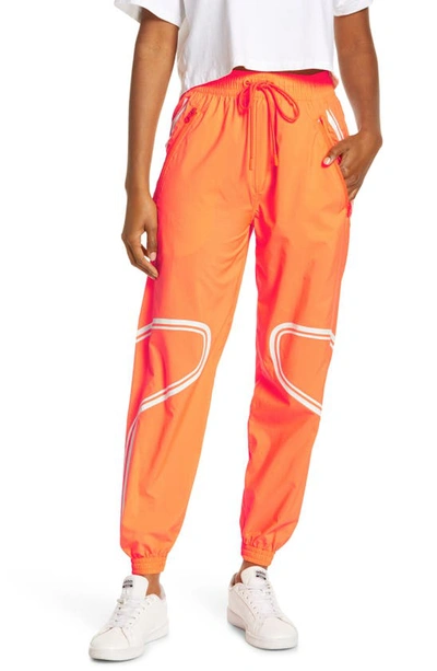 Adidas By Stella Mccartney High Waist Recycled Polyester Track Pants In Orange