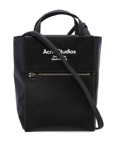 Acne Studios Logo Print Zipped Patch Small Canvas Tote In Black