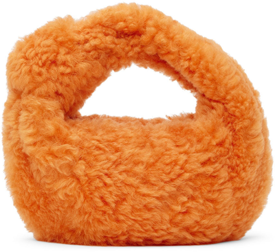 Bottega Veneta Jodie Mini Shearling Hobo Bag In 7513 Light Orange Go
