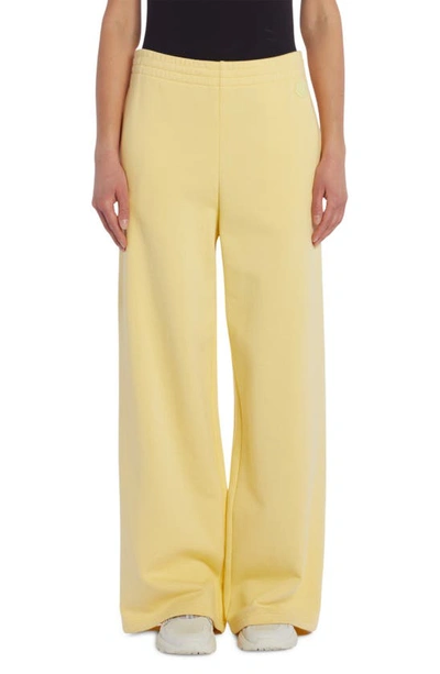 Moncler Wide Leg Cotton Blend Fleece Joggers In 110 Yellow
