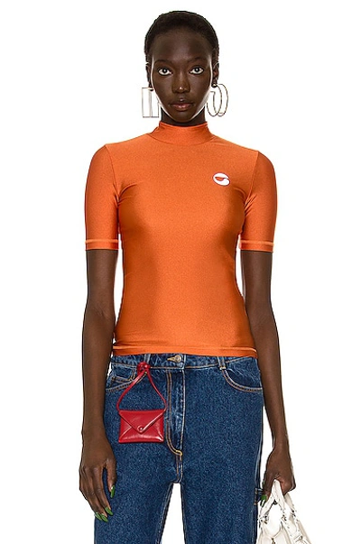 Coperni Logo-print Mock-neck T-shirt In Burnt Orange