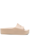 Balenciaga Logo-embossed Rubber Flatform Slides In Neutrals
