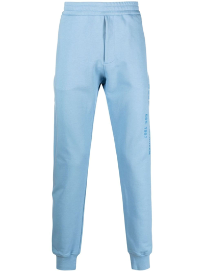 Alexander Mcqueen Logo-print Slip-on Track Pants In Blue