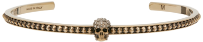 Alexander Mcqueen Skull Charm Cuff Bracelet In Gold