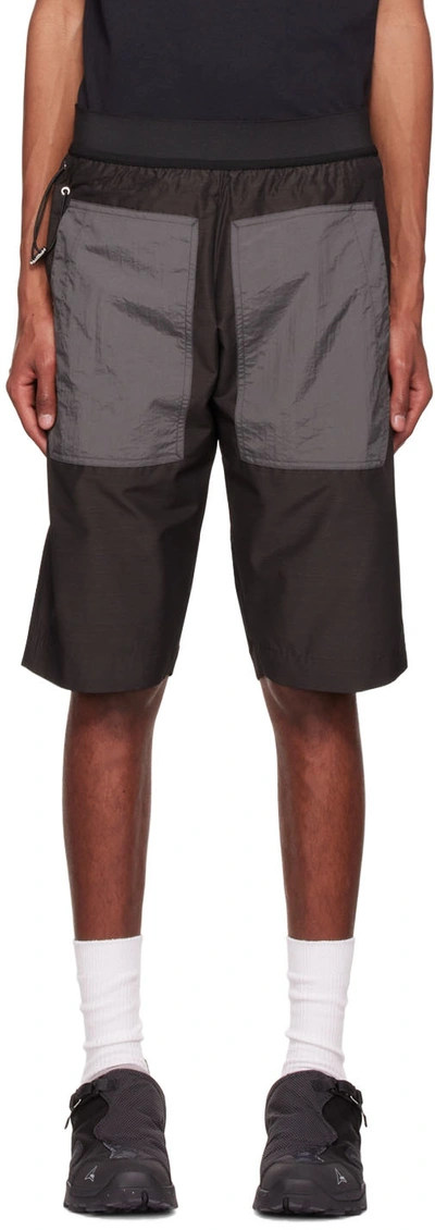 Arnar Mar Jonsson Hraun Contrast-pocket Relaxed Fit Shell Shorts In Black