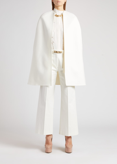 Valentino Wool-cashmere Cape With Chain Detail In Ivory ModeSens