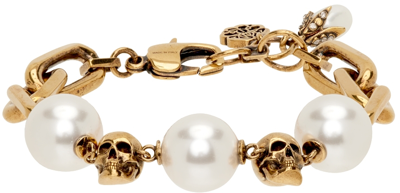 Alexander Mcqueen Pearl-embellished Skull Bracelet In Oro
