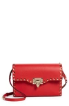 Valentino Garavani Medium Rockstud Leather Shoulder Bag In Rouge Pur