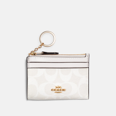 Coach Outlet Mini Skinny Id Case In Signature Canvas In White