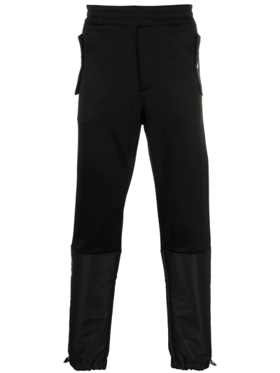 Alexander Mcqueen Panelled Tapered Track Pants In Black
