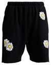 Natasha Zinko Daisy-print Distressed Cotton-blend Shorts In Black