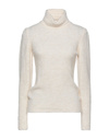 Gabardine Turtlenecks In Ivory