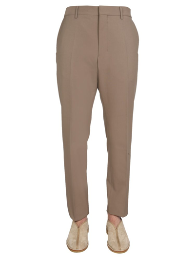 Ami Alexandre Mattiussi Ami Pleat Detailed Cropped Trousers In Beige