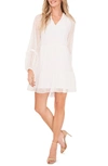 Cece Clip Dot Ruffle Long Sleeve Shift Dress In Soft Ecru