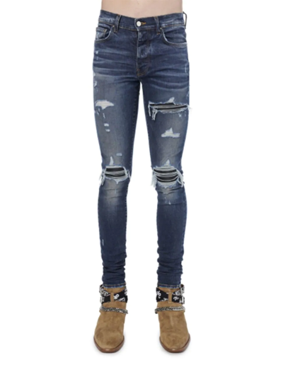 Amiri Mx1 Skinny-fit Panelled Distressed Jeans In Blue