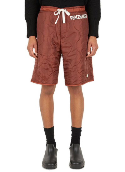 Oamc Embroidered-logo Quilted Shorts In Orange