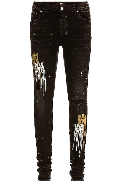 Amiri Stencil Black Distressed Skinny Jeans