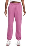 Nike Women's  Sportswear Essential Collection Fleece Pants In Purple