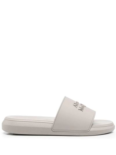 Alexander Mcqueen Embossed-logo Open-toe Slides In Grey