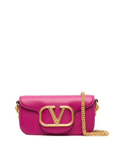 Valentino Garavani Fuchsia Locò Leather Crossbody Bag In Pink