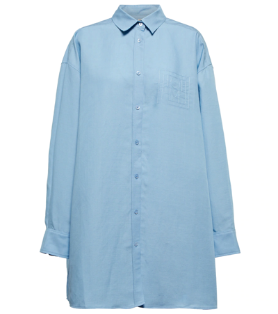 Totême Longline Monogram-embroidered Lyocell-blend Shirt In Sky Blue