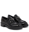 Prada Triangle Logo Patent Leather Loafer In Nero