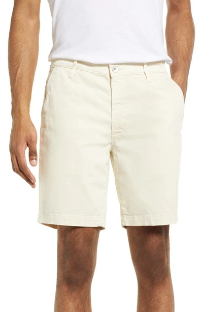 Ag Slim Fit 8.5 Inch Cotton Shorts In White Cream