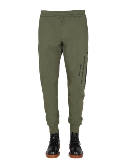 Alexander Mcqueen Men's Jogging Pants With Graffiti Logo In Brown