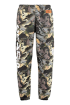 Heron Preston Graphic Camouflage Sweatpants In Verde Militare