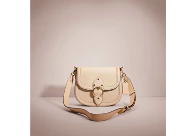 Coach Restored Beat Saddle Bag In Brass/ivory