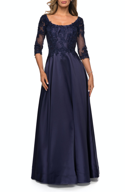 La Femme Three Quarter Sleeve Gown With Lace Sheer Back In Blue