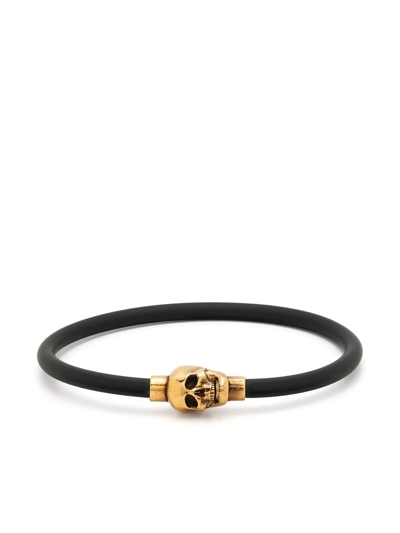 Alexander Mcqueen Rubber Cord Skull Bracelet In Gold