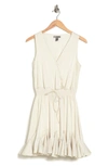 Love By Design Camilla Sleeveless Wrap Mini Dress In Gardenia