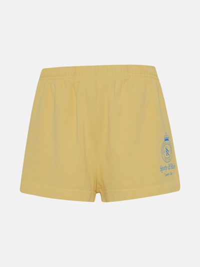 Sporty And Rich Cotton Crown Disco Shorts In Yellow