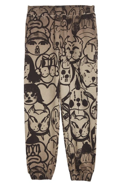 Givenchy Chito Graffiti Print Joggers In 305-khaki