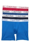 Calvin Klein 4-pack Boxer Briefs In 0g5 Sho/ Hsb/ Sco