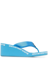 ALEXANDER WANG LOGO-PRINT WEDGE FLIP FLOPS