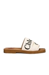 Chloé Woody Flat Logo Ribbon Slide Sandals In Neutral