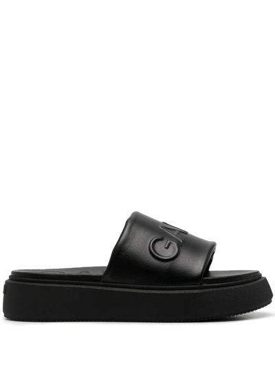 Ganni Logo-embossed Vegan Leather Platform Slides In Black