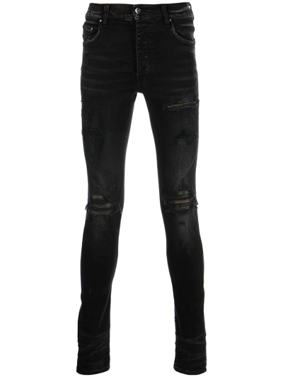 Amiri Ripped-knee Logo-print Skinny Jeans In Black