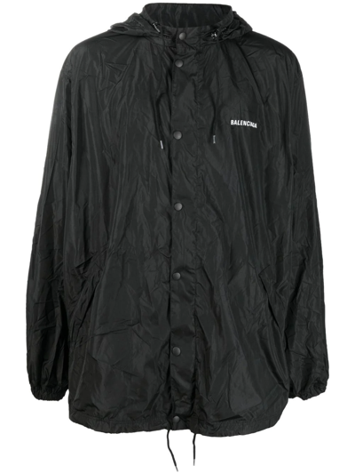 Balenciaga Logo-print Hooded Raincoat Jacket In Black