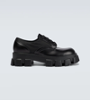 Prada Monolith Brushed Leather Derby Shoes In Nero