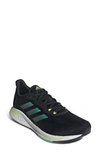 Adidas Originals Supernova Running Shoe In Core Black/ Rush/ Yellow