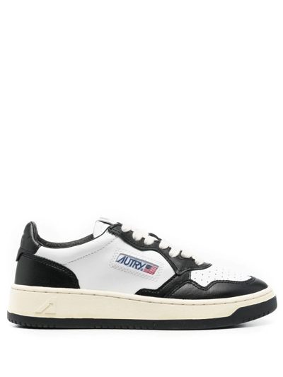 Autry Low Top Leather Sneakers With Perforated Toe In Black Leather