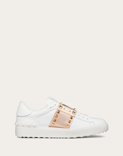 Valentino Garavani Rockstud Untitled Sneaker In Calfskin Leather With Metallic Stripe Woman White/co In White/copper