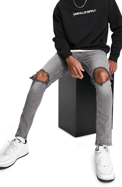 Asos Design Ripped Skinny Jeans In Black