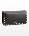 Valentino Garavani Rockstud Pouch Leather Shoulder Bag In P45 Poudre